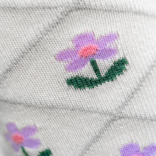 Damenfüße mit Inschriften SOXO pink